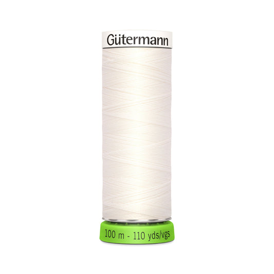 A spool of Gutermann Sew-all rPET 100m thread in white color, indicating the length and quality of the thread.
