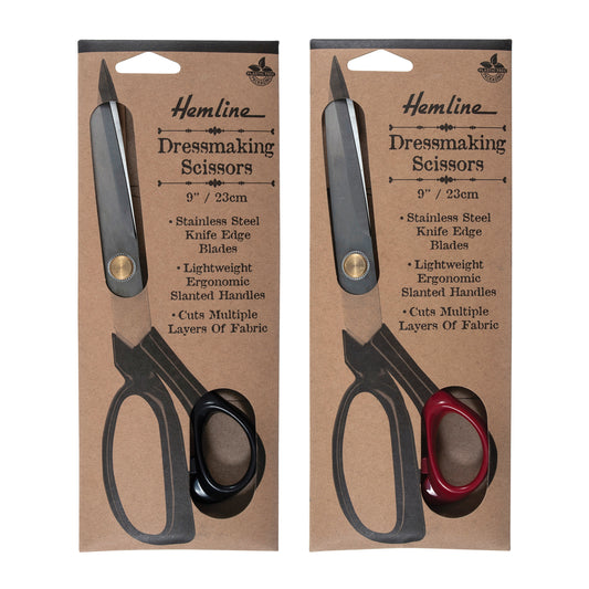 Two packages of Hemline dressmaking scissors with black and red handles on a white background.