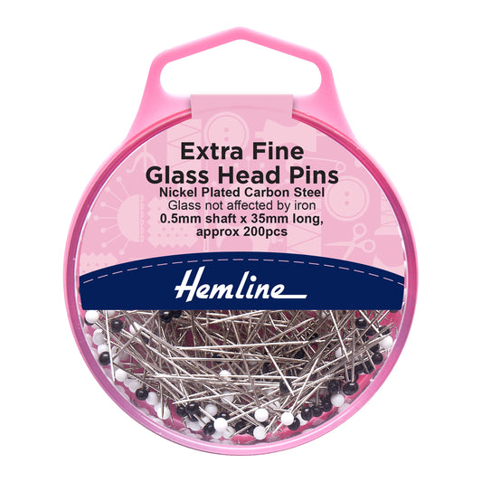 Pink container of Hemline extra fine glass head pins on a white background