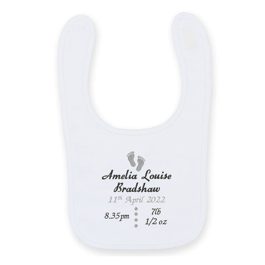 White baby bib with personalized text on a white background