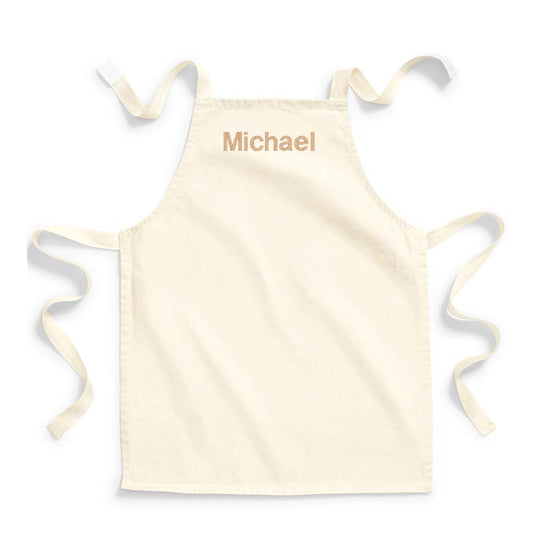 Beige apron with 'Michael' printed on it against a white background