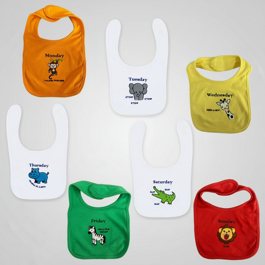 Set of seven colorful baby bibs with days of the week and animal illustrations on a white background.