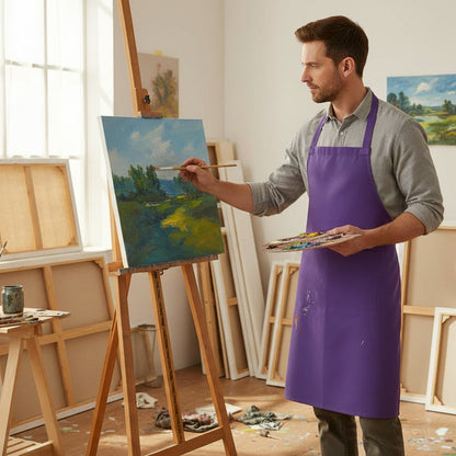 Man painting a landscape on an easel in a studio filled with art supplies.