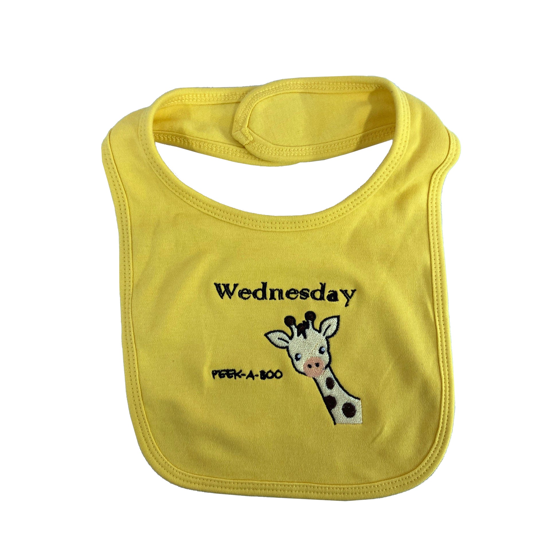 Yellow bib with a giraffe design and text