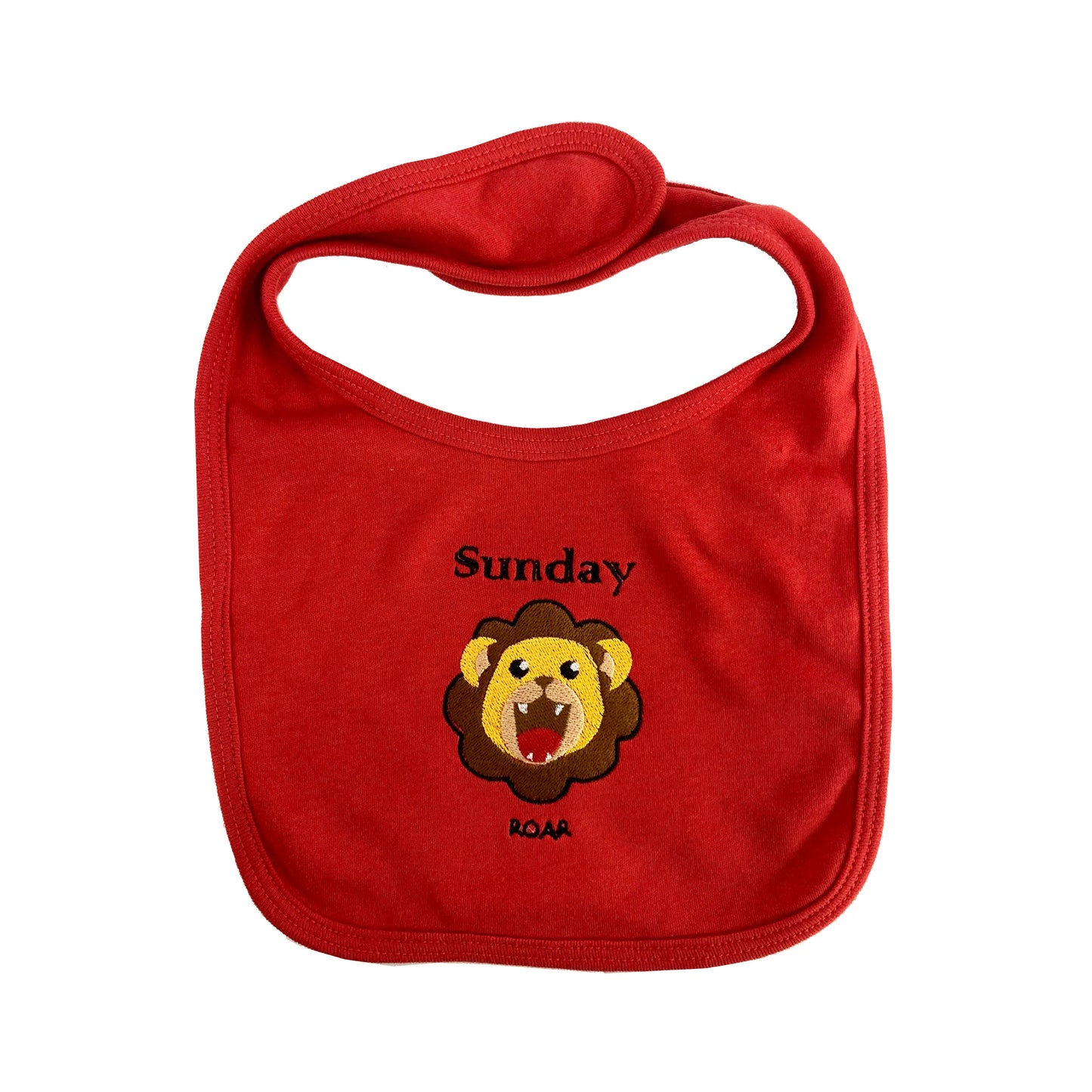 Red bib with a lion graphic and 'Sunday' text on a white background