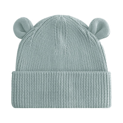 A light sage green knit beanie hat with two small bear ears on top, shown against a plain white background.