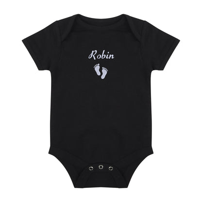 A black short-sleeve baby bodysuit with 'Robin' and baby footprints embroidered in white on the chest, displayed flat against a white background.