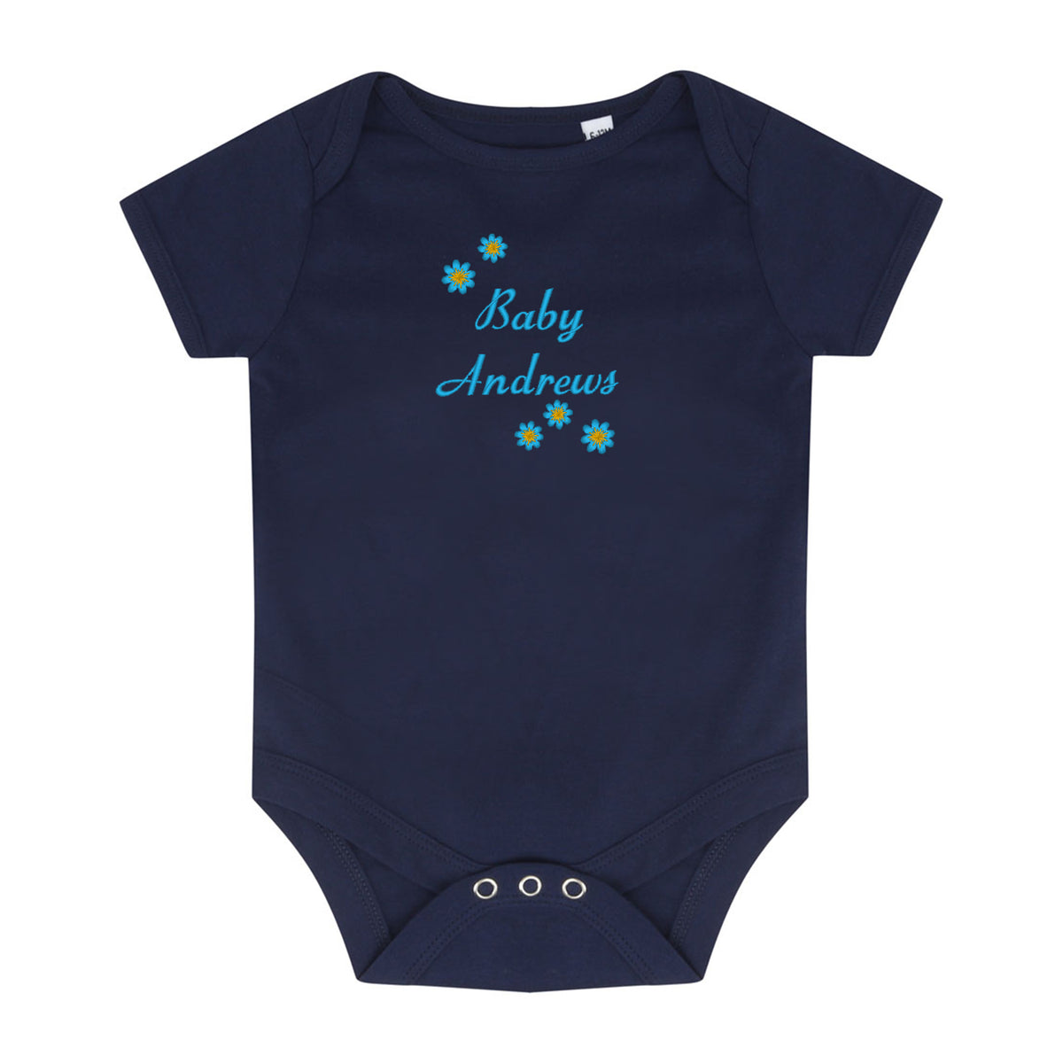 A navy blue short-sleeve baby bodysuit with 'Baby Andrews' embroidered in light blue script on the chest, decorated with small blue and yellow flowers. The bodysuit features three silver snap closures at the crotch and is displayed flat against a solid white background.