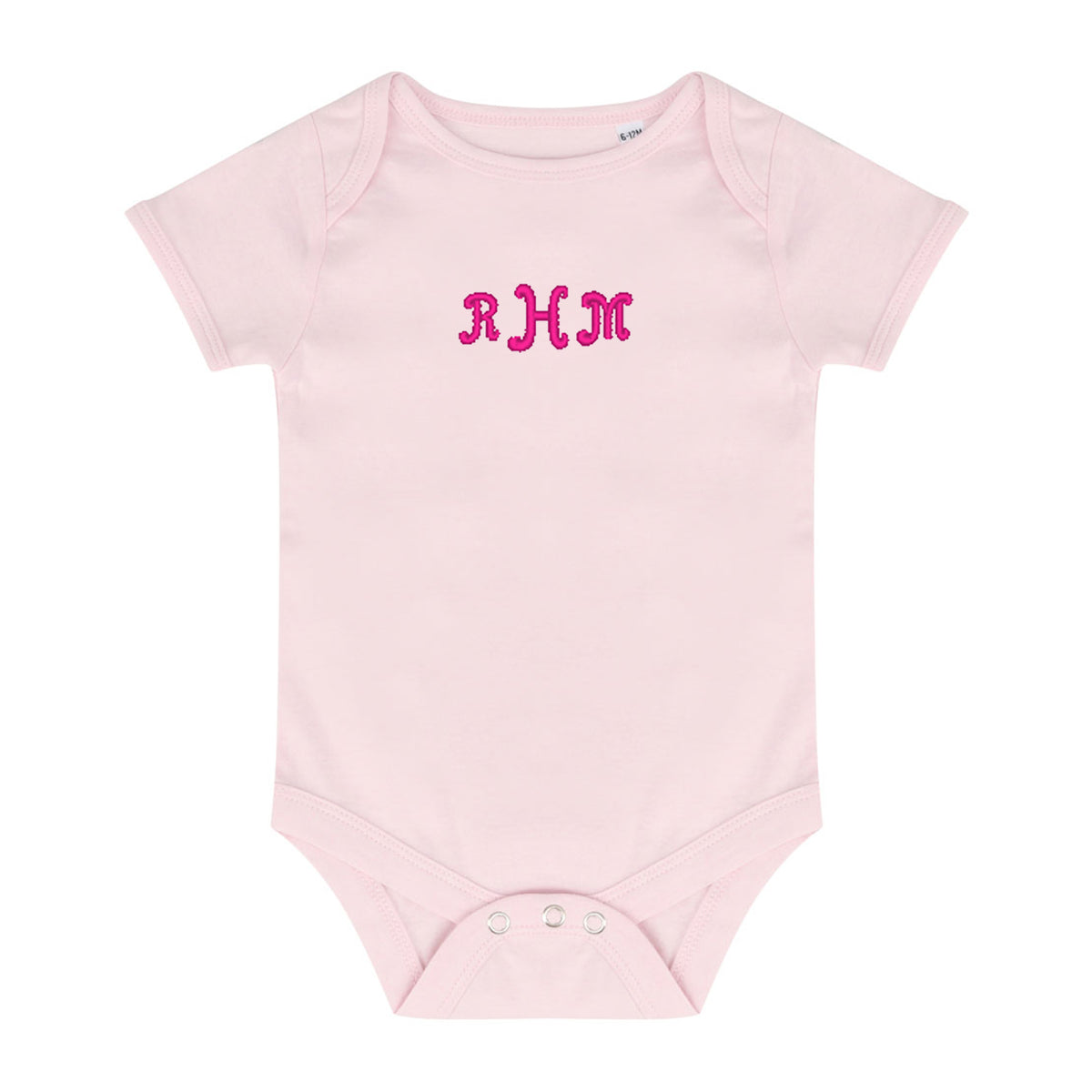 pale pink baby bodysuit with a pink embroidered monogram 