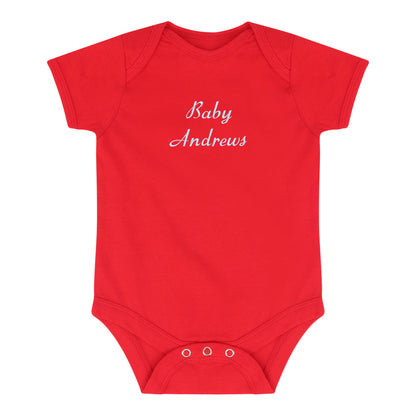 A red short-sleeve baby bodysuit with 'Baby Andrews' embroidered in white script across the chest, displayed on a clean white background.