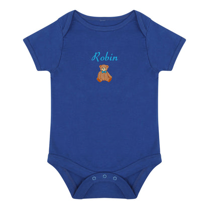 A royal blue short-sleeve baby bodysuit with 'Robin' and a small brown teddy bear graphic embroidered on the chest, displayed on a solid white background.