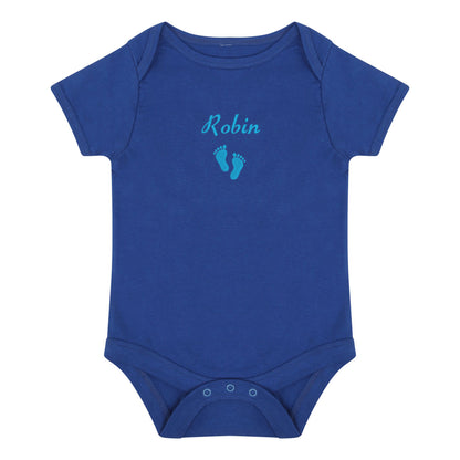 A royal blue short-sleeve baby bodysuit with 'Robin' and a pair of baby feet embroidered in light blue on the chest, displayed flat against a white background.