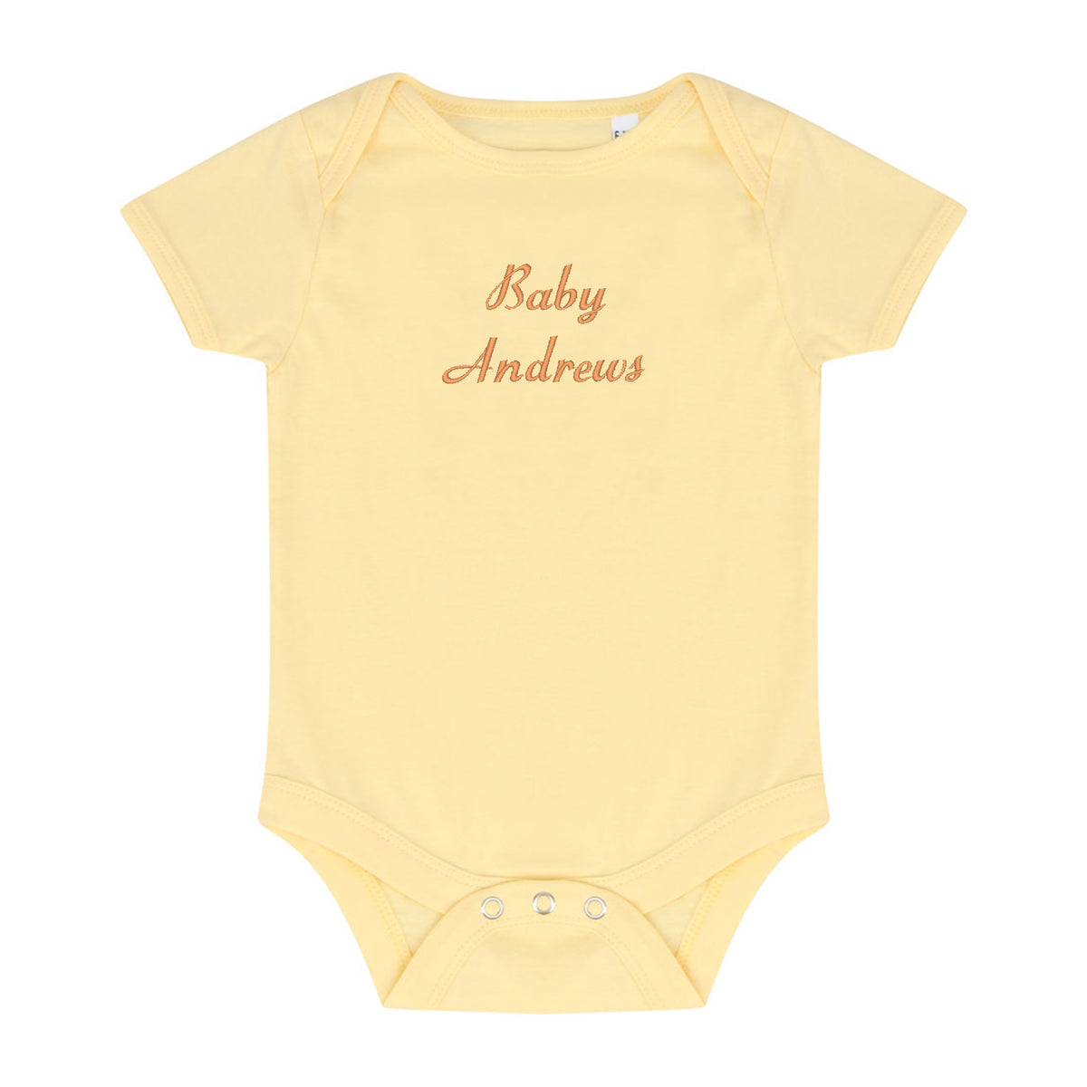 A pale yellow short-sleeve baby bodysuit with 'Baby Andrews' embroidered in a rose-gold cursive font on the chest, displayed flat against a solid white background.